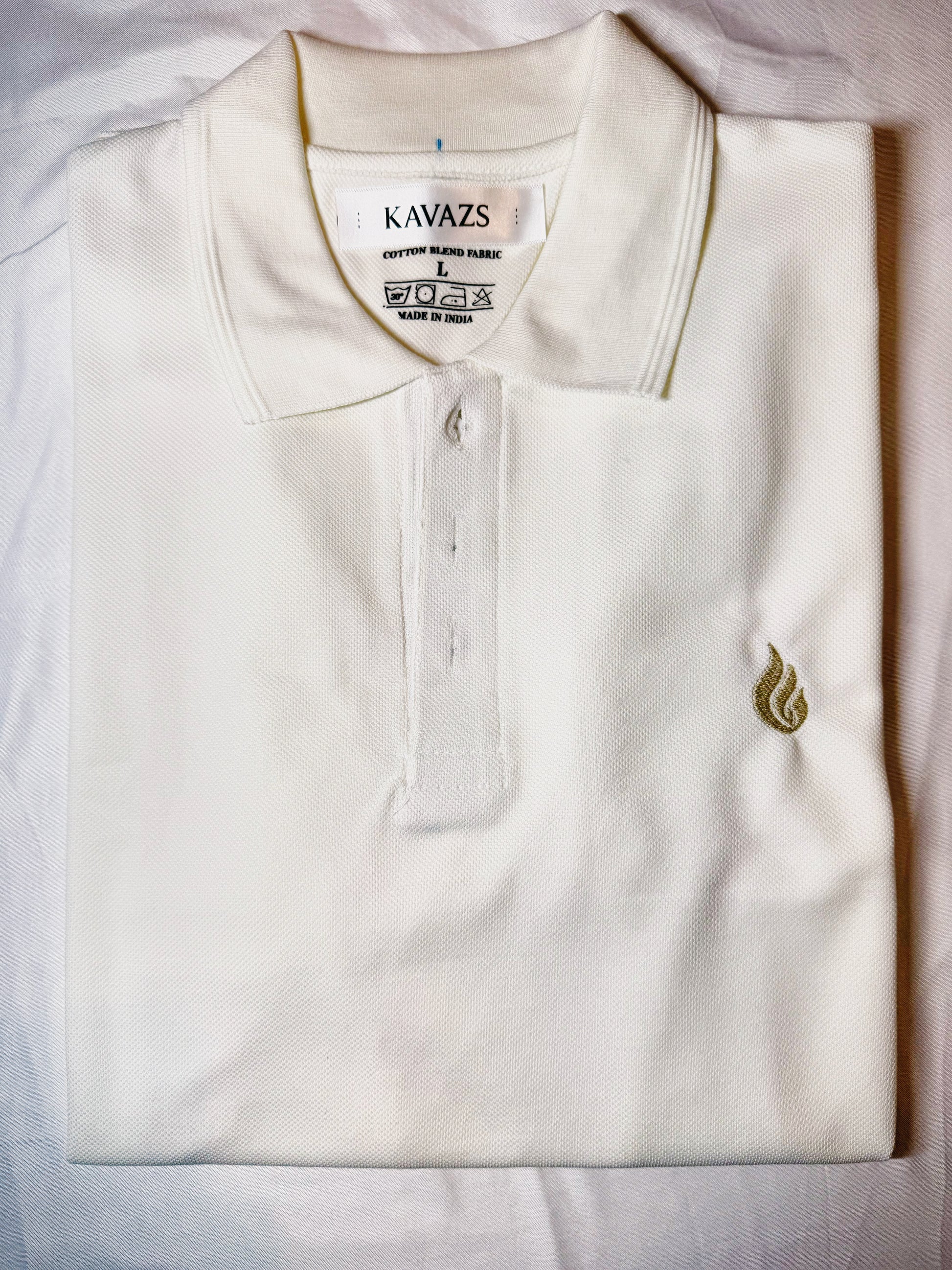 White polo shirt with a small Kavazs logo on a light background