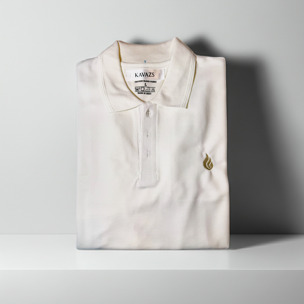 Folded white polo shirt with a kavazs brand label on a gray background