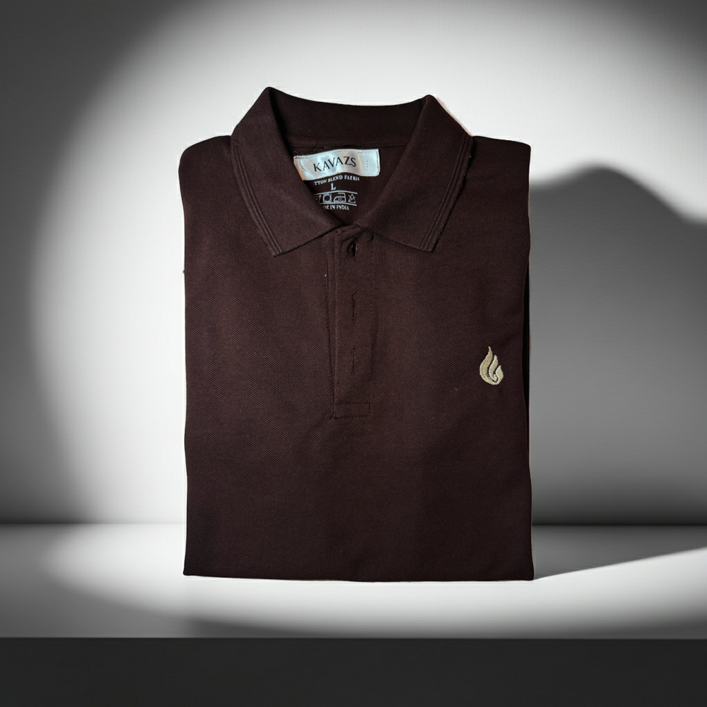 Folded brown polo shirt with a kavazs logo on a gray background